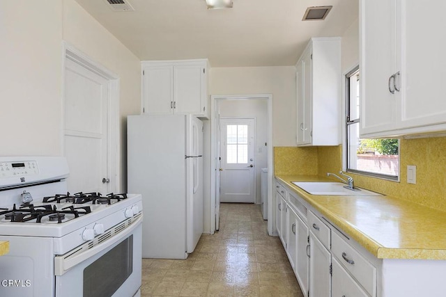 2327 Roscommon Ave, Monterey Park, CA 91754 - kitchen with white appliances, a sink, and white cabinetry