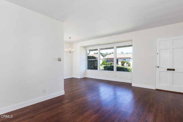 2327 Roscommon Ave, Monterey Park, CA 91754 - spare room featuring a chandelier, dark wood finished floors, and baseboards
