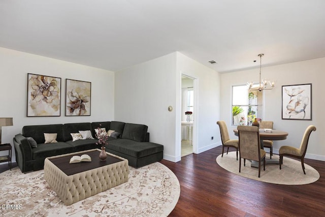 2327 Roscommon Ave, Monterey Park, CA 91754 - living room featuring wood finished floors, a chandelier, and baseboards
