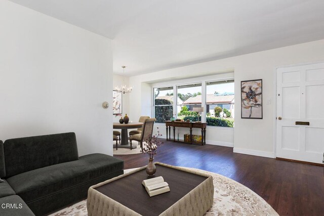 2327 Roscommon Ave, Monterey Park, CA 91754 - living area with dark wood-style flooring, a chandelier, and baseboards