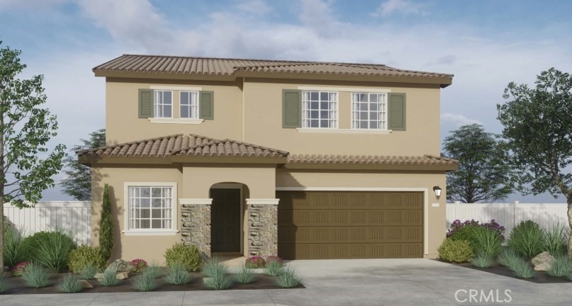 11619 Ford St, Beaumont, CA 92223 - view of front of property with a garage, fence, driveway, and stucco siding