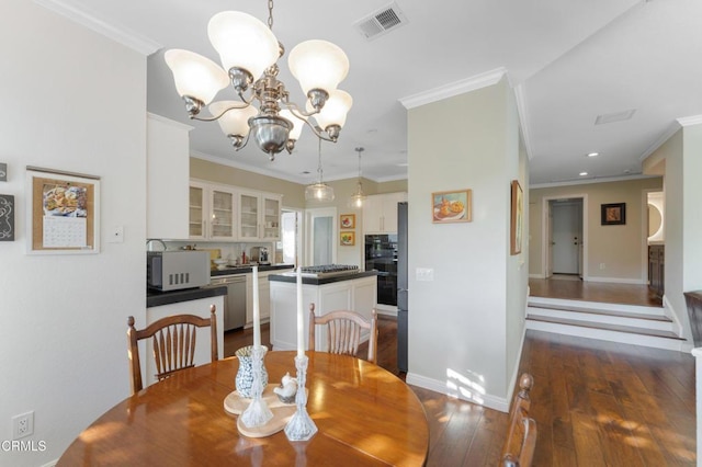 3153 Dragonfly St, Glendale, CA 91206 - dining room featuring a chandelier, dark wood-type flooring, ornamental molding, baseboards, and recessed lighting