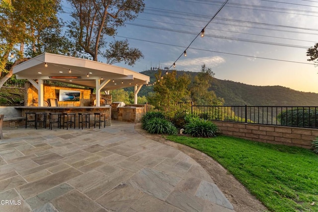 3153 Dragonfly St, Glendale, CA 91206 - patio terrace at dusk featuring a mountain view