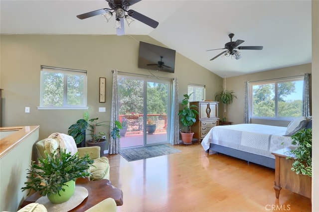 6097 Sherlock Rd, Midpines, CA 95345 - bedroom featuring access to outside, wood finished floors, ceiling fan, and high vaulted ceiling