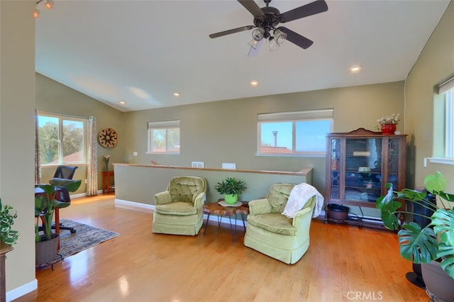 6097 Sherlock Rd, Midpines, CA 95345 - sitting room with wood finished floors, ceiling fan, lofted ceiling, baseboards, and recessed lighting
