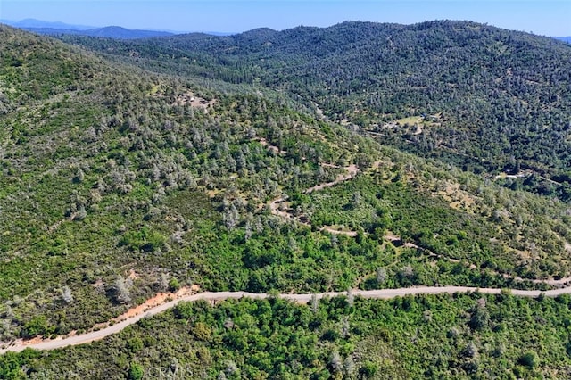 6097 Sherlock Rd, Midpines, CA 95345 - aerial overview of property's location featuring a mountain backdrop and a forest