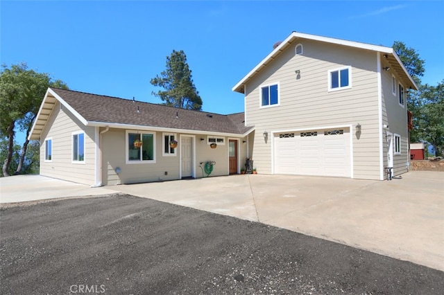 6097 Sherlock Rd, Midpines, CA 95345 - traditional-style house with driveway and a garage