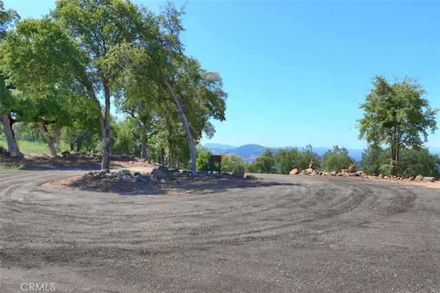 6097 Sherlock Rd, Midpines, CA 95345 - view of road featuring a mountain view