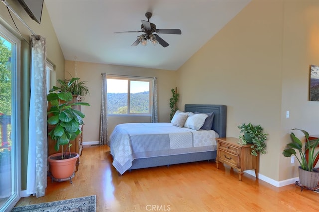 6097 Sherlock Rd, Midpines, CA 95345 - bedroom featuring light wood-type flooring, vaulted ceiling, baseboards, and ceiling fan