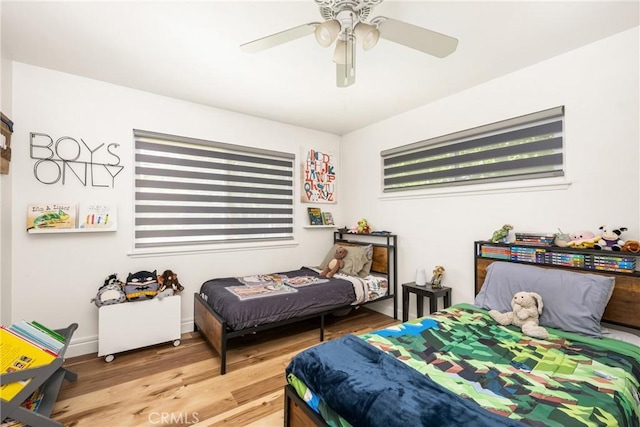 13381 Del Cerro Dr, Tustin, CA 92780 - bedroom featuring wood finished floors and ceiling fan