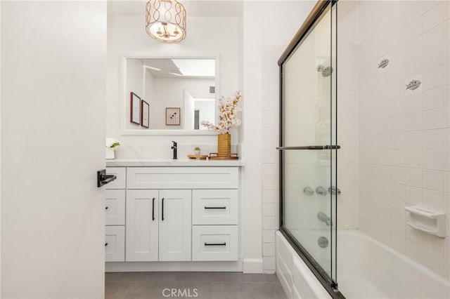13381 Del Cerro Dr, Tustin, CA 92780 - bathroom featuring tile patterned floors, enclosed tub / shower combo, and vanity