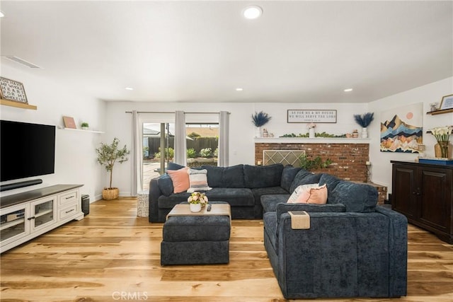 13381 Del Cerro Dr, Tustin, CA 92780 - living room featuring light wood-style floors and recessed lighting