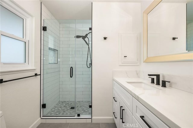 13381 Del Cerro Dr, Tustin, CA 92780 - full bathroom featuring a stall shower, vanity, baseboards, and tile patterned flooring