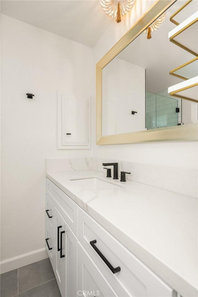 13381 Del Cerro Dr, Tustin, CA 92780 - bathroom with vanity, tile patterned floors, and baseboards