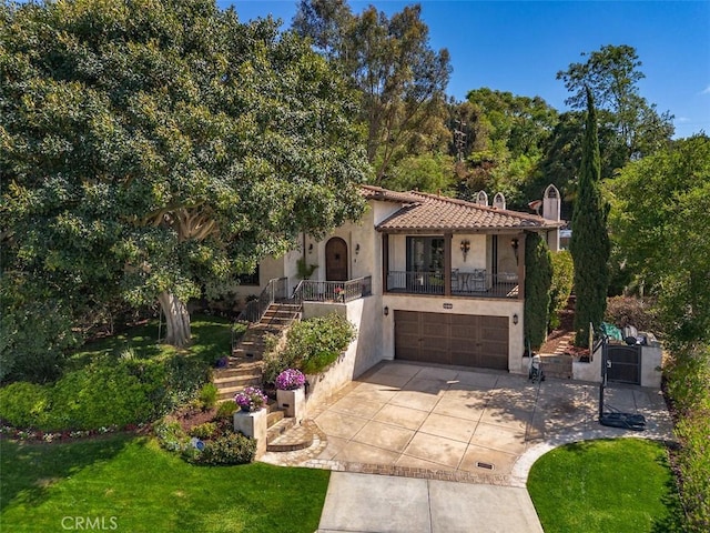 3904 Via Cardelina, Palos Verdes Estates, CA 90274 - mediterranean / spanish home with stairway, driveway, stucco siding, an attached garage, and a tile roof