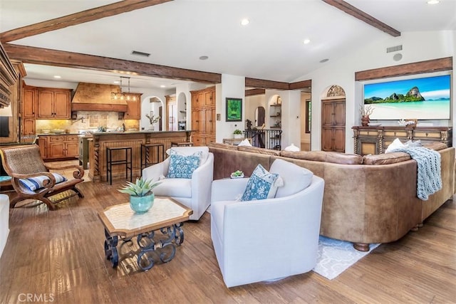 3904 Via Cardelina, Palos Verdes Estates, CA 90274 - living area with arched walkways, wood finished floors, and recessed lighting