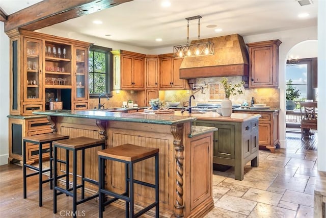 3904 Via Cardelina, Palos Verdes Estates, CA 90274 - bar featuring custom exhaust hood, a sink, backsplash, recessed lighting, and arched walkways