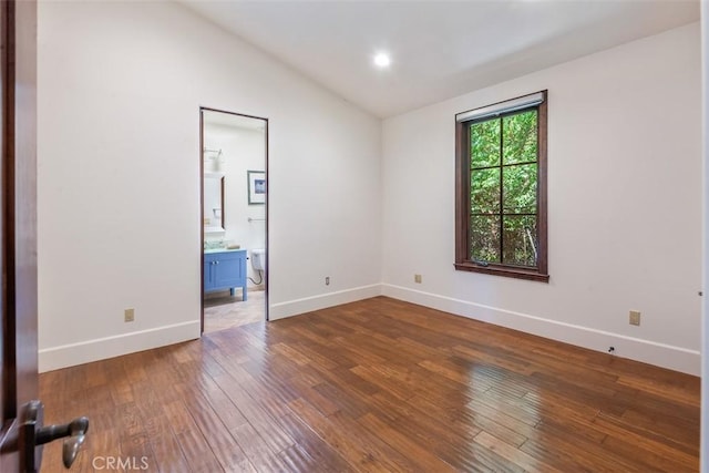3904 Via Cardelina, Palos Verdes Estates, CA 90274 - spare room featuring lofted ceiling, baseboards, dark wood-style floors, and recessed lighting