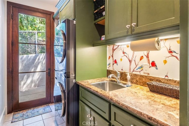 3904 Via Cardelina, Palos Verdes Estates, CA 90274 - clothes washing area featuring stacked washer and clothes dryer, cabinet space, light tile patterned flooring, and bar with sink