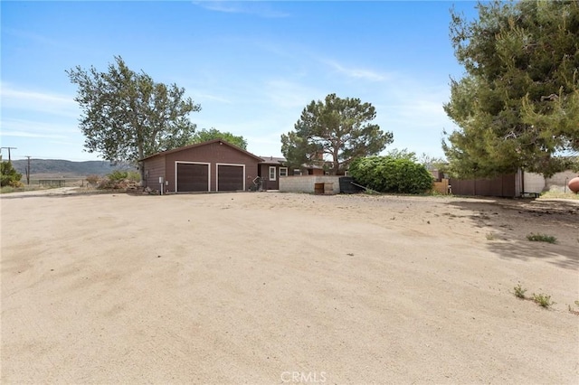 18333 Lancaster Rd, Lancaster, CA 93536 - view of yard with fence and a garage