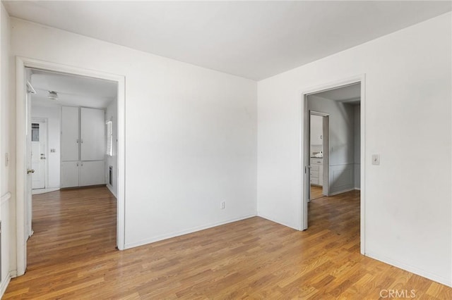 18333 Lancaster Rd, Lancaster, CA 93536 - empty room featuring light wood-style floors and baseboards