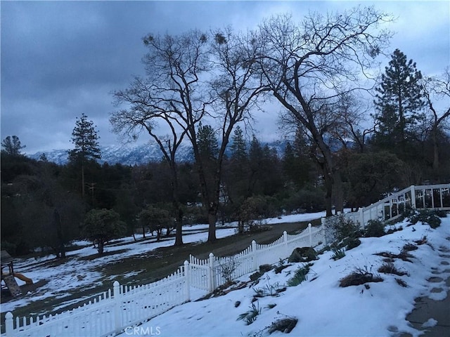 32760 Ram Ln, North Fork, CA 93643 - yard covered in snow featuring a wooded view