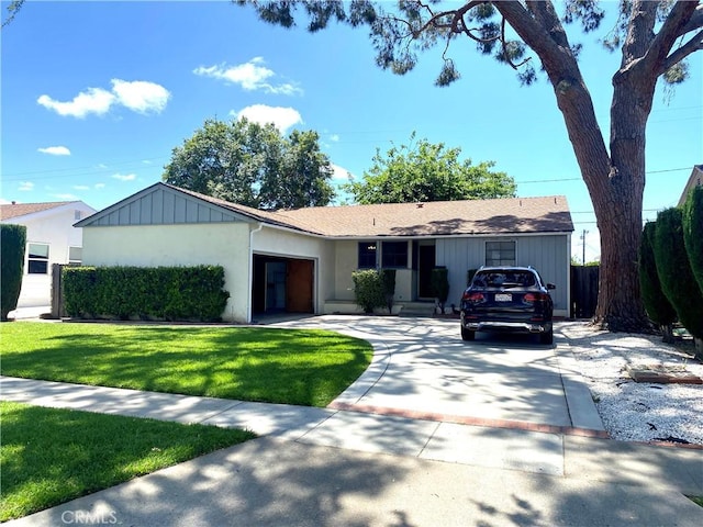 single story home featuring driveway and stucco siding
