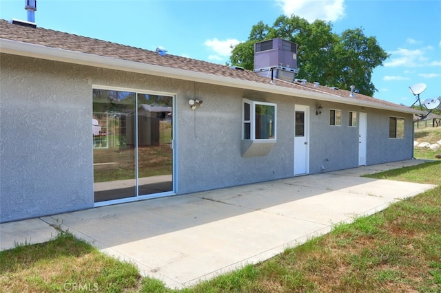 43038 Glacier Ln, Coarsegold, CA 93614 - back of house with stucco siding, a patio, and a shingled roof