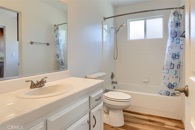 43038 Glacier Ln, Coarsegold, CA 93614 - bathroom featuring wood finished floors, shower / bath combination with curtain, vanity, and toilet