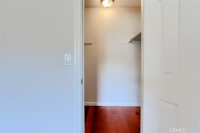 43038 Glacier Ln, Coarsegold, CA 93614 - spacious closet with dark wood-style flooring