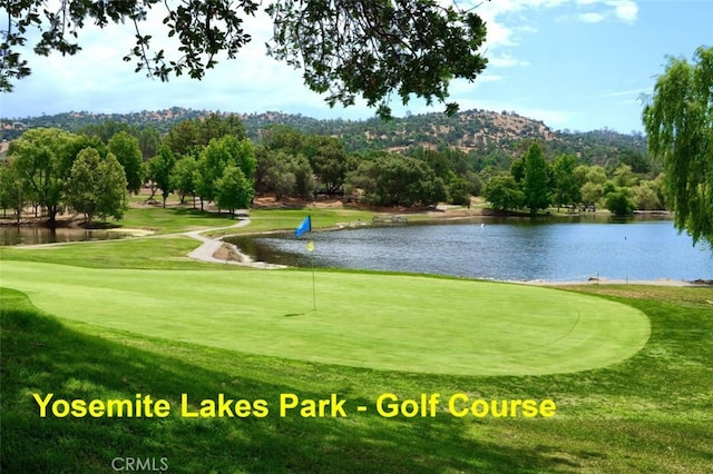 43038 Glacier Ln, Coarsegold, CA 93614 - view of home's community featuring a water and mountain view, view of golf course, and a lawn