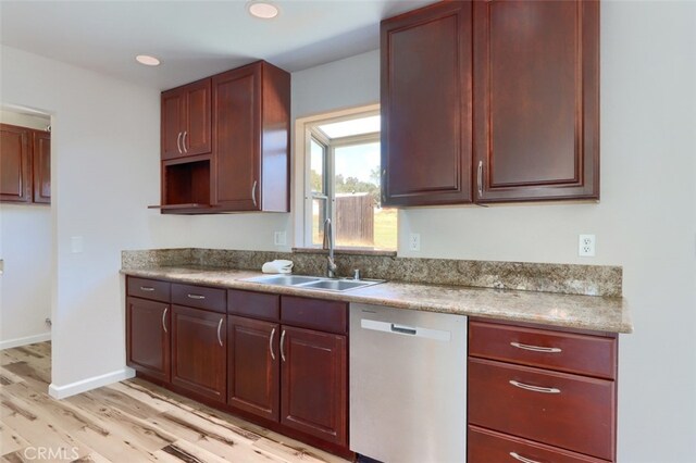 43038 Glacier Ln, Coarsegold, CA 93614 - kitchen with dishwasher, a sink, light wood-type flooring, light countertops, and recessed lighting