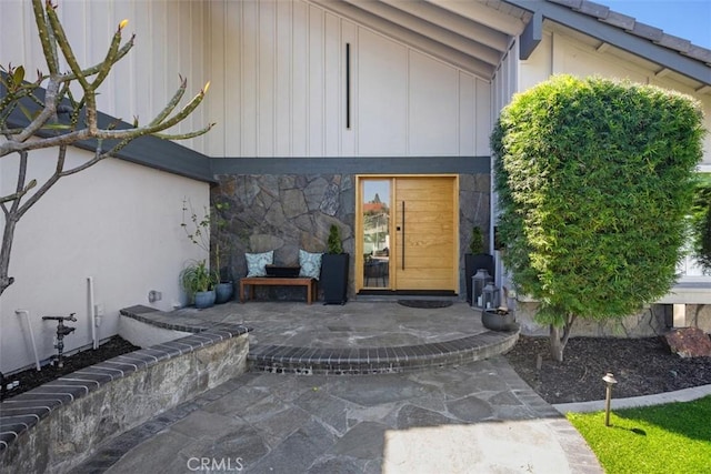 25232 Grissom Rd, Laguna Hills, CA 92653 - entrance to property with stone siding and a patio