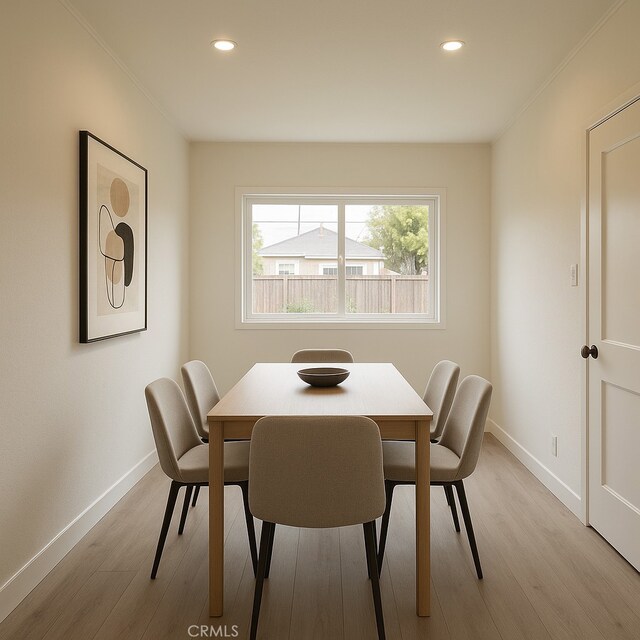 2236 Ann Arbor Ave, Pomona, CA 91766 - dining room featuring light wood-style floors, recessed lighting, baseboards, and ornamental molding