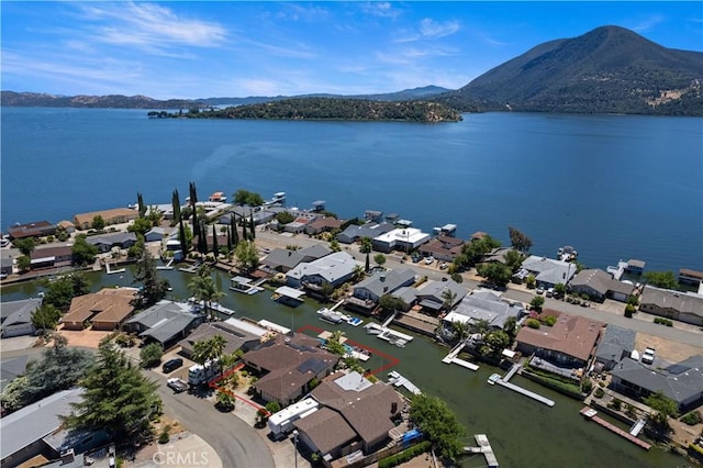 7795 Richard Dr, Lucerne, CA 95458 - aerial perspective of suburban area with a water and mountain view