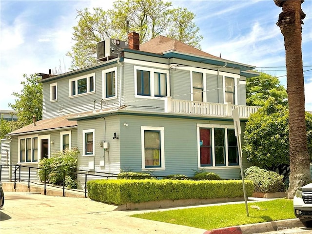 4308 Lime St, Riverside, CA 92501 - view of front facade featuring a chimney