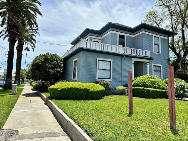 4308 Lime St, Riverside, CA 92501 - view of home's exterior featuring a balcony and a yard