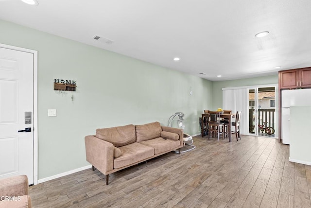 126 E Ventura St Unit F, Santa Paula, CA 93060 - living area with light wood-style floors and recessed lighting