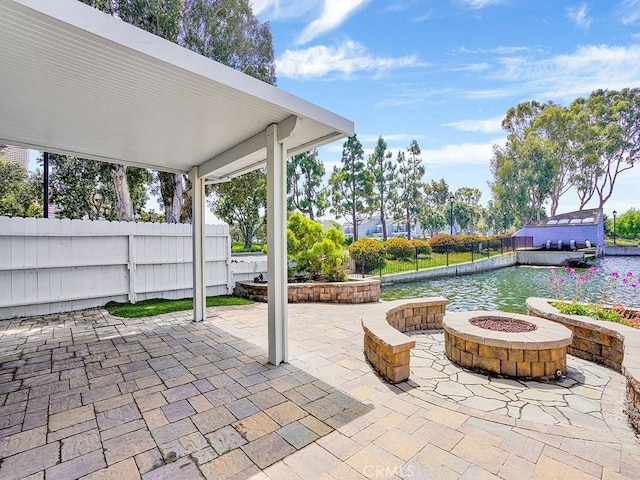 3842 Montego Dr, Huntington Beach, CA 92649 - view of patio with an outdoor fire pit and fence
