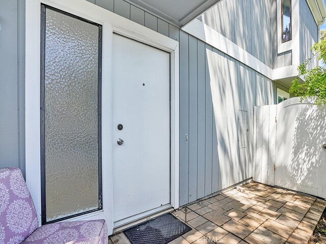 3842 Montego Dr, Huntington Beach, CA 92649 - view of exterior entry with board and batten siding