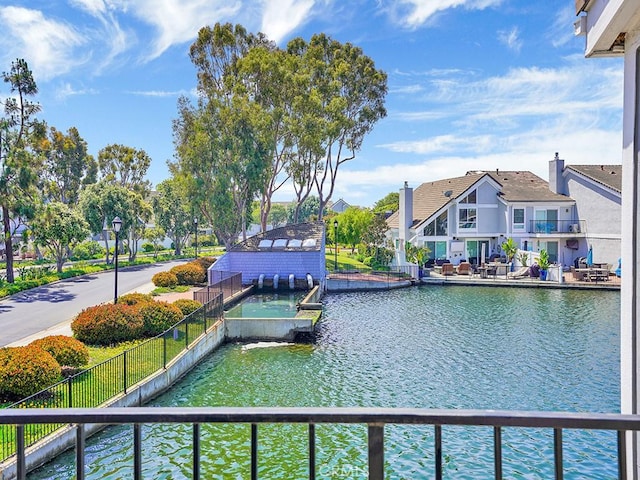 3842 Montego Dr, Huntington Beach, CA 92649 - dock area featuring a water view and fence
