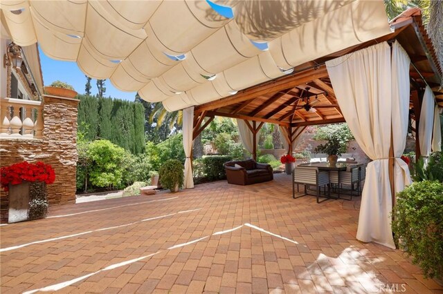 24182 Torena Cir, Mission Viejo, CA 92691 - view of patio / terrace featuring a gazebo, a ceiling fan, outdoor lounge area, and outdoor dining area