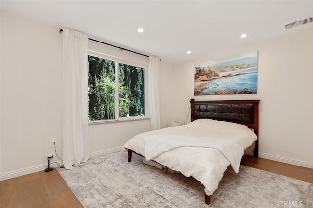24182 Torena Cir, Mission Viejo, CA 92691 - bedroom featuring wood finished floors, recessed lighting, and baseboards