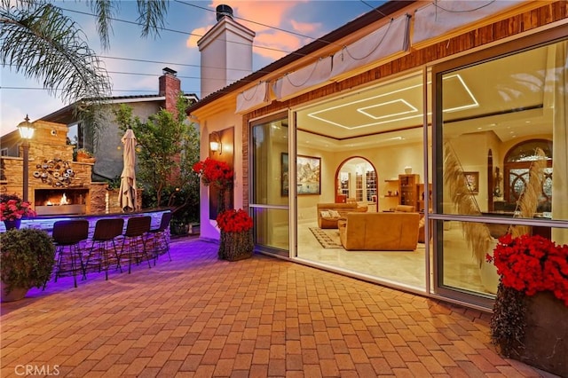 24182 Torena Cir, Mission Viejo, CA 92691 - view of patio featuring an outdoor living space with a fireplace