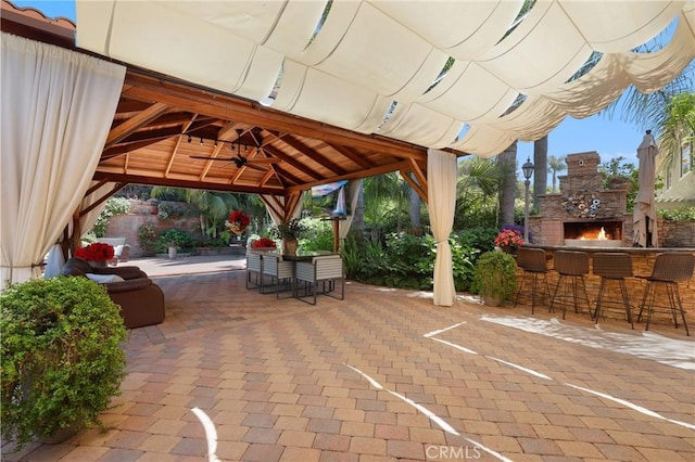 24182 Torena Cir, Mission Viejo, CA 92691 - view of patio / terrace featuring a gazebo, ceiling fan, and exterior bar