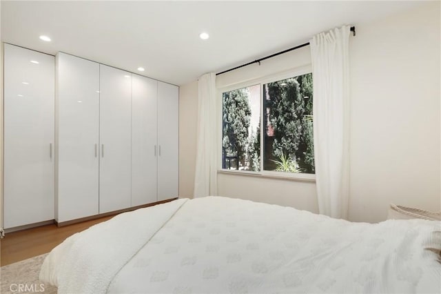 24182 Torena Cir, Mission Viejo, CA 92691 - bedroom featuring recessed lighting, wood finished floors, and a closet