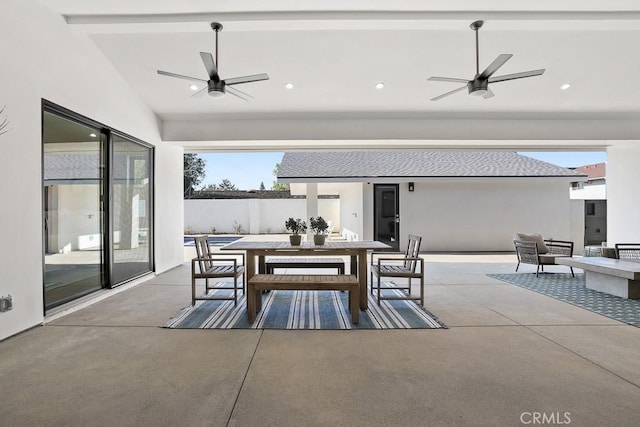 view of patio with ceiling fan, outdoor dining space, and outdoor lounge area