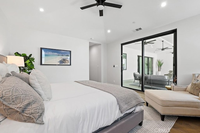 bedroom featuring access to outside, wood finished floors, recessed lighting, and a ceiling fan