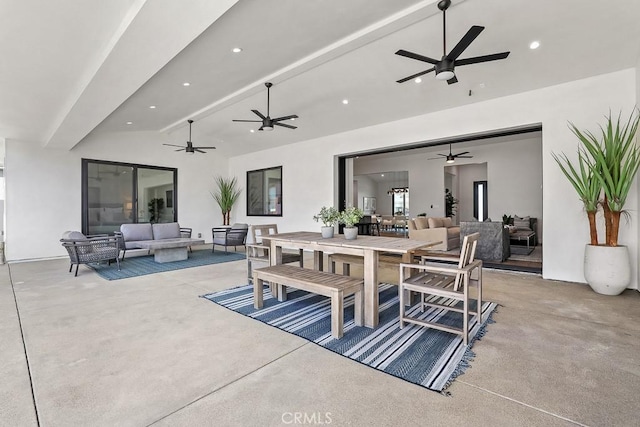 view of patio / terrace with outdoor lounge area, a ceiling fan, and outdoor dining area
