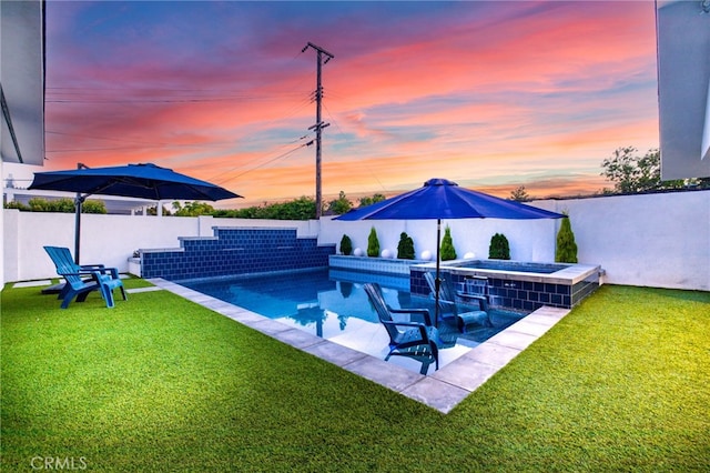 view of pool featuring a pool with connected hot tub and a patio area